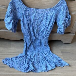 Blue floral smocked, mini dress size small new with tags tie back